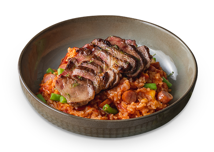 Fried Iberico pork chop over tomato risotto